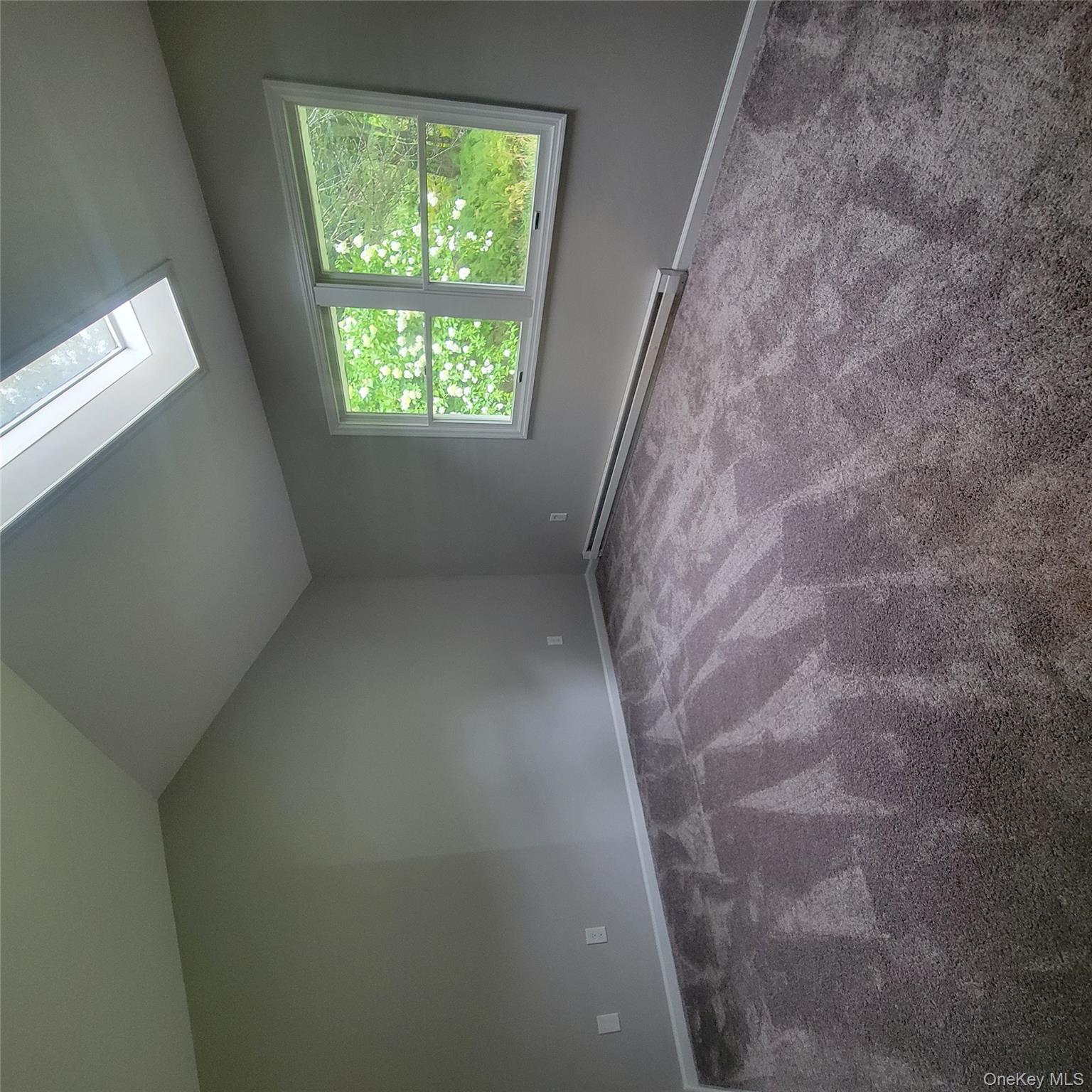 21 Browns Road Livingston Manor, NY 12758 - Photo 4 of 28 an empty room with windows