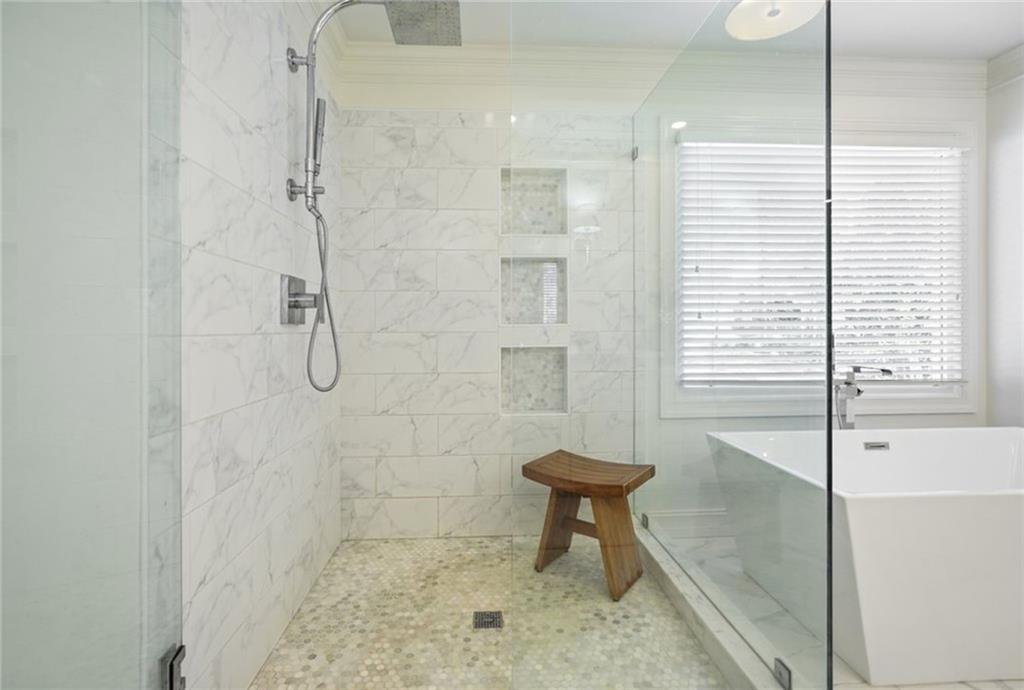 1260 Elk Ridge Cove Alpharetta, GA 30005 - Photo 37 of 87 a bathroom with a shower and a toilet
