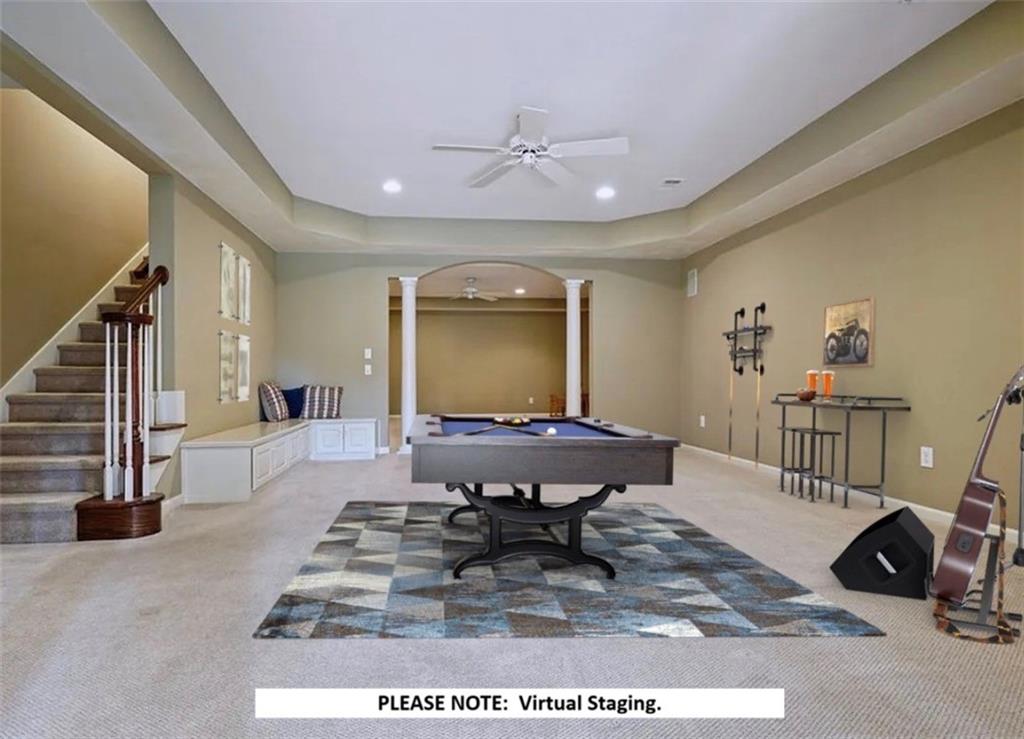 1260 Elk Ridge Cove Alpharetta, GA 30005 - Photo 50 of 87 a living room with furniture