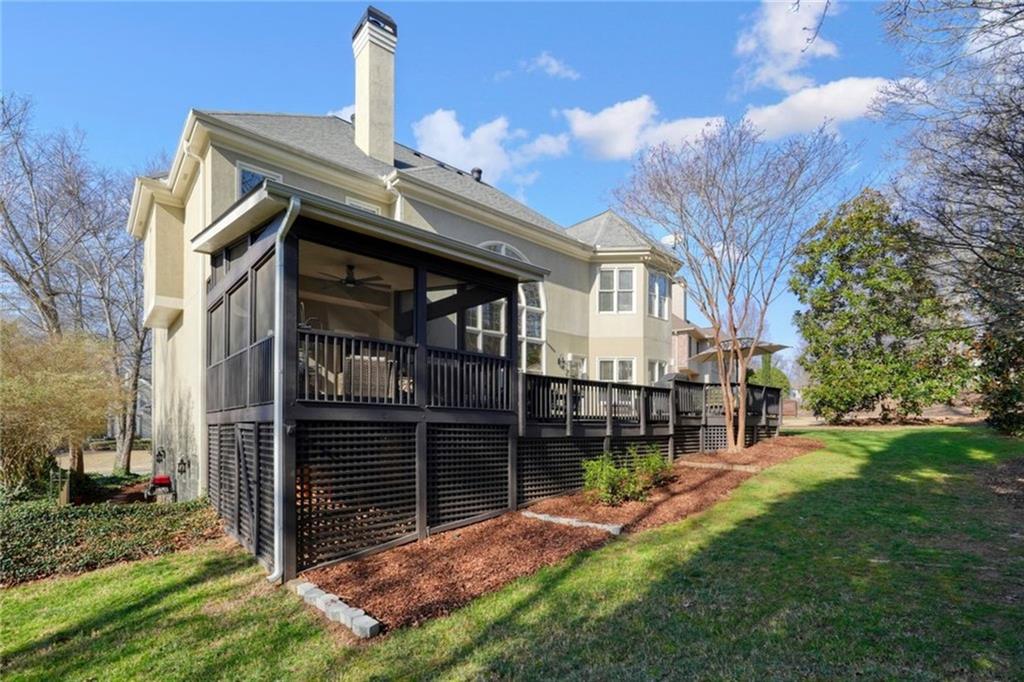 1260 Elk Ridge Cove Alpharetta, GA 30005 - Photo 67 of 87 a view of a house with a yard