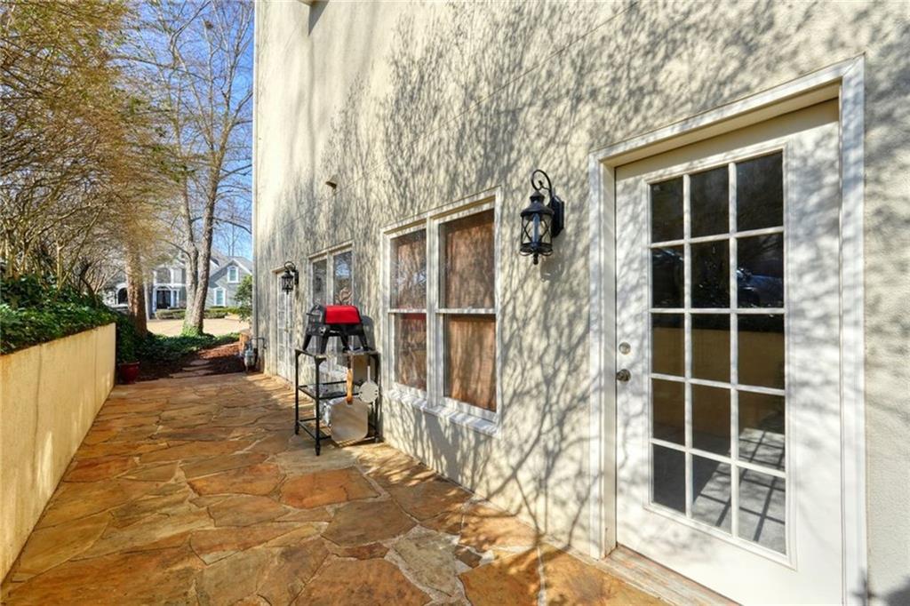 1260 Elk Ridge Cove Alpharetta, GA 30005 - Photo 73 of 87 a view of a house with a large window