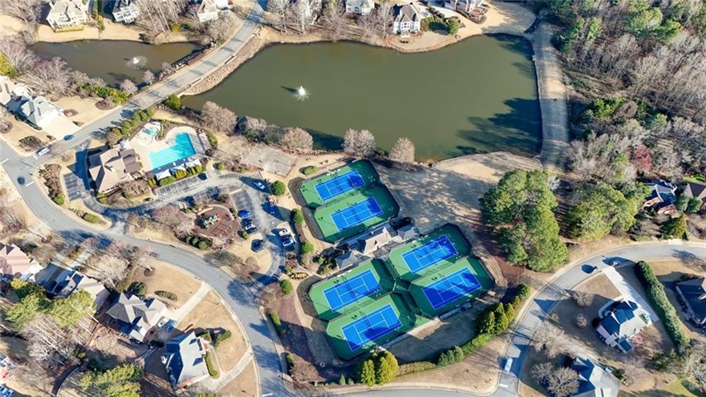 1260 Elk Ridge Cove Alpharetta, GA 30005 - Photo 77 of 87 an aerial view of a house with a yard