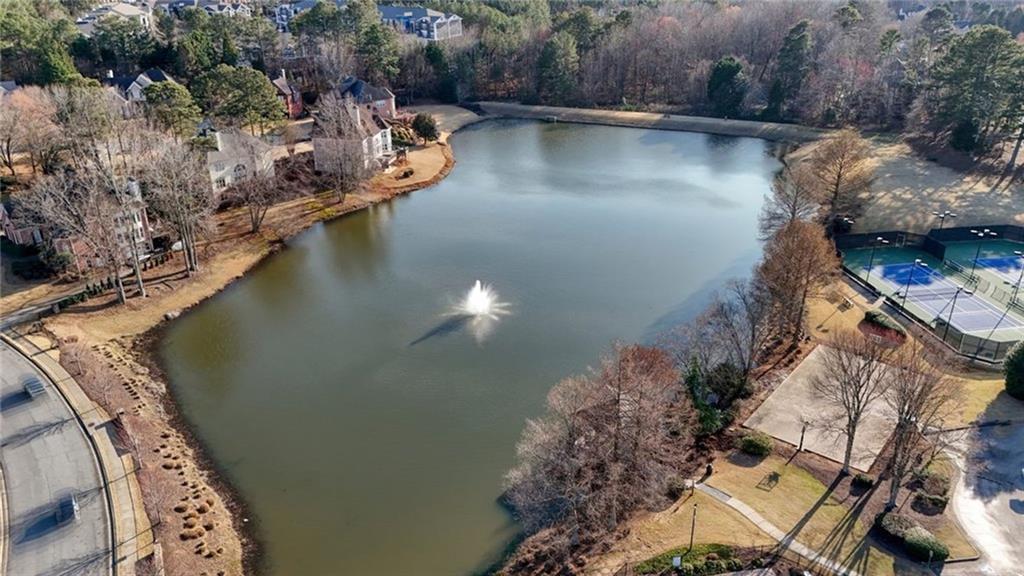 1260 Elk Ridge Cove Alpharetta, GA 30005 - Photo 81 of 87 an aerial view of residential house with outdoor space and lake view