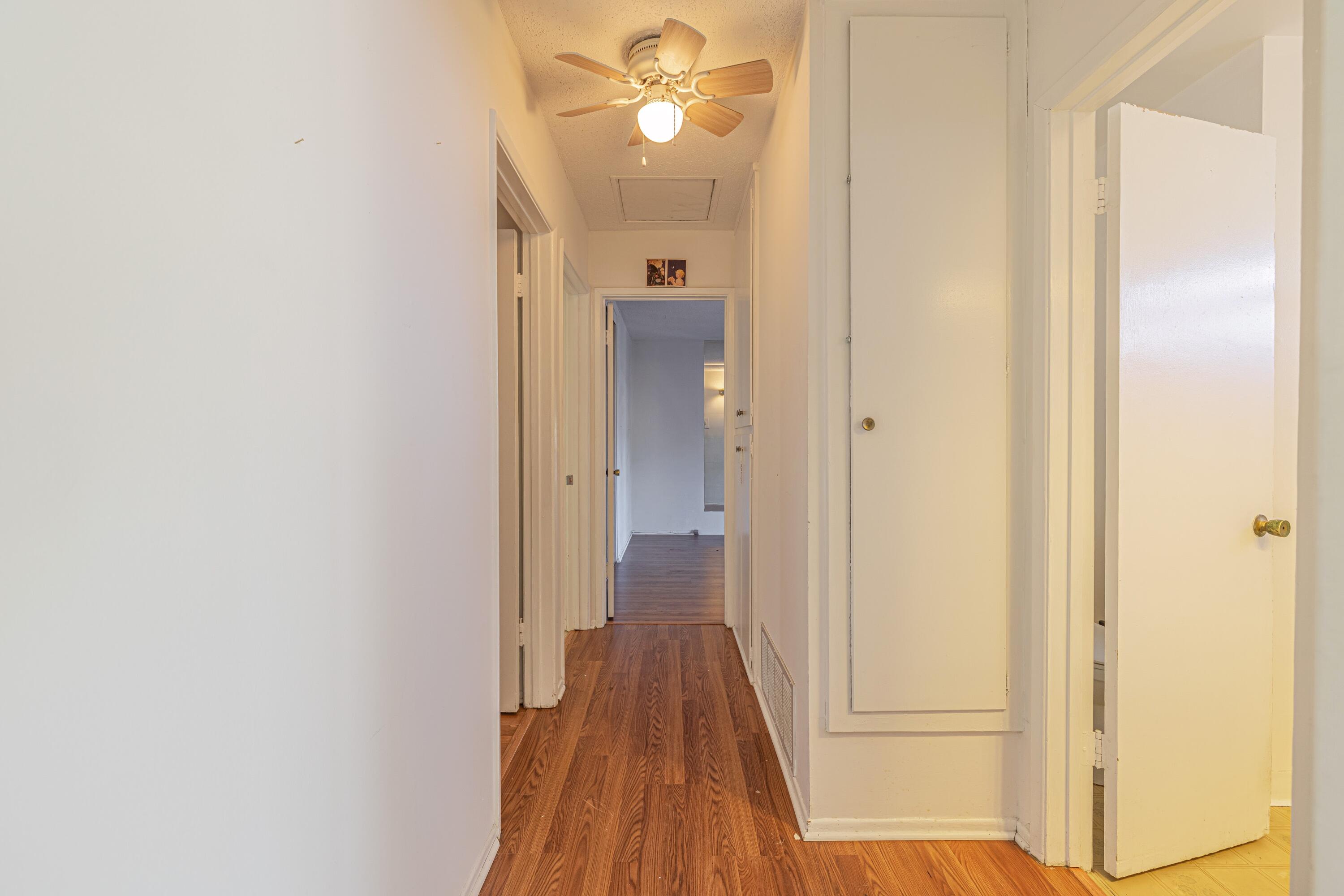 1108 Valiant Street Lancaster, CA 93534 - Photo 11 of 21 a view of a hallway with wooden floor