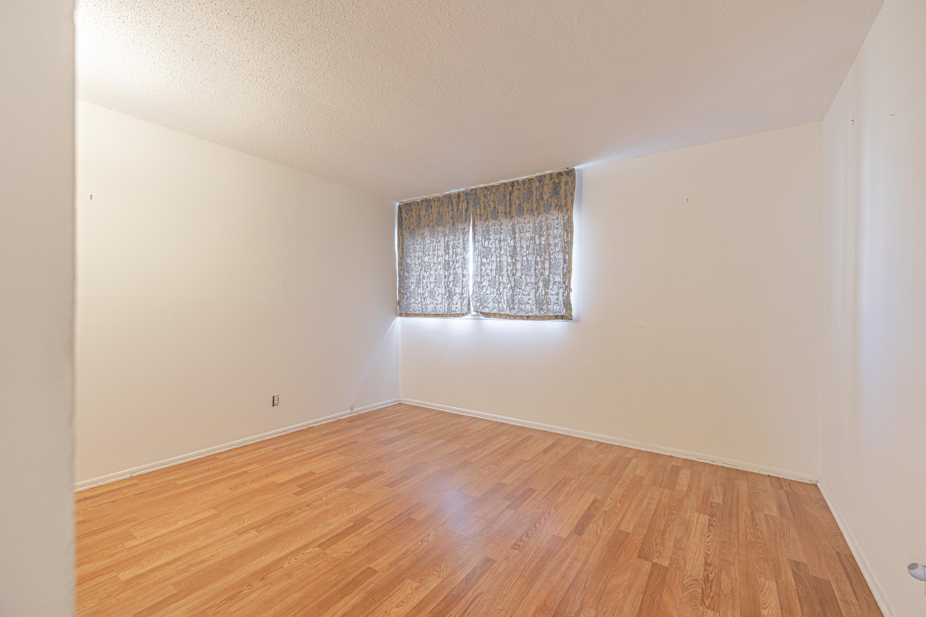 1108 Valiant Street Lancaster, CA 93534 - Photo 18 of 21 an empty room with a window