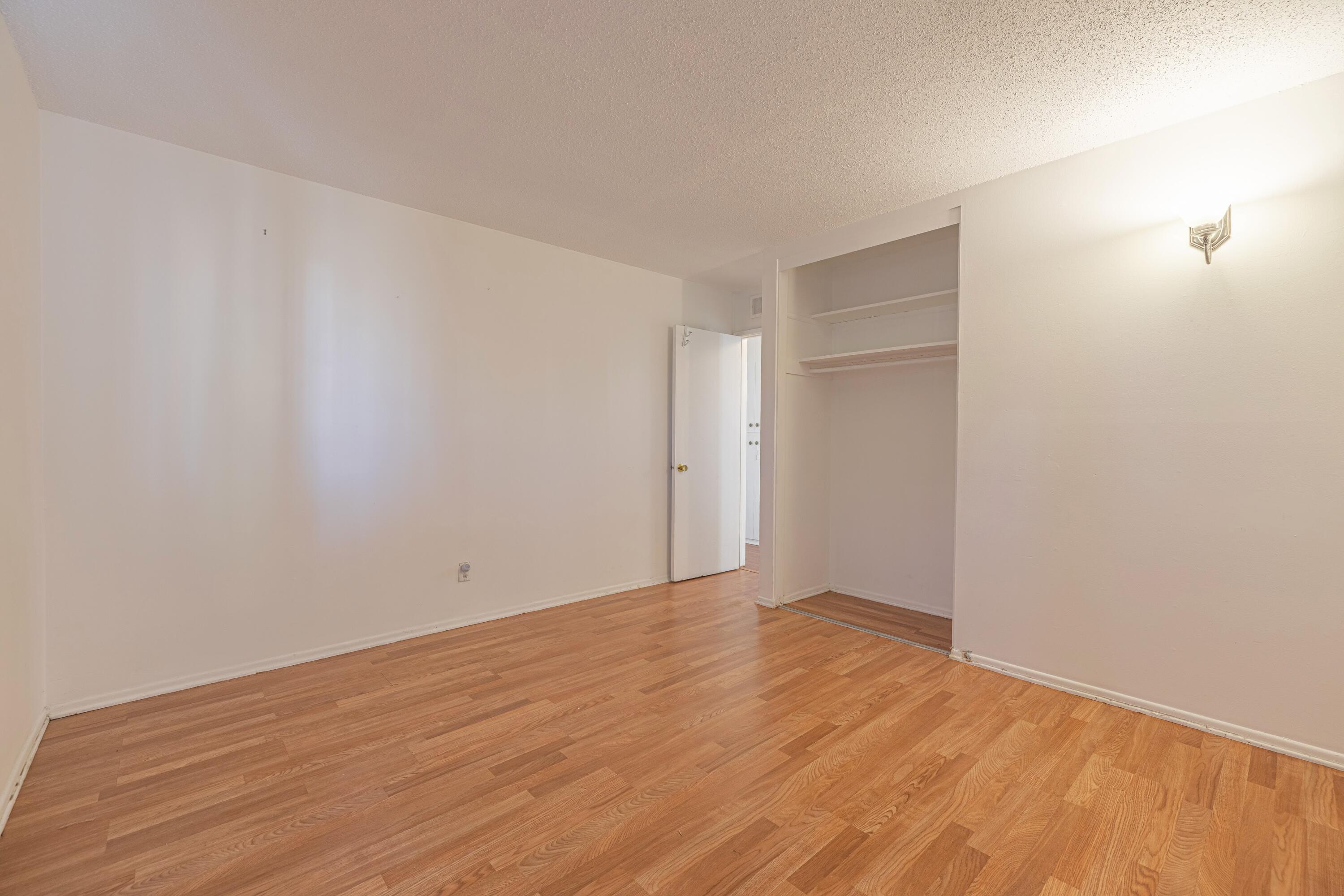 1108 Valiant Street Lancaster, CA 93534 - Photo 19 of 21 a view of an empty room with wooden floor