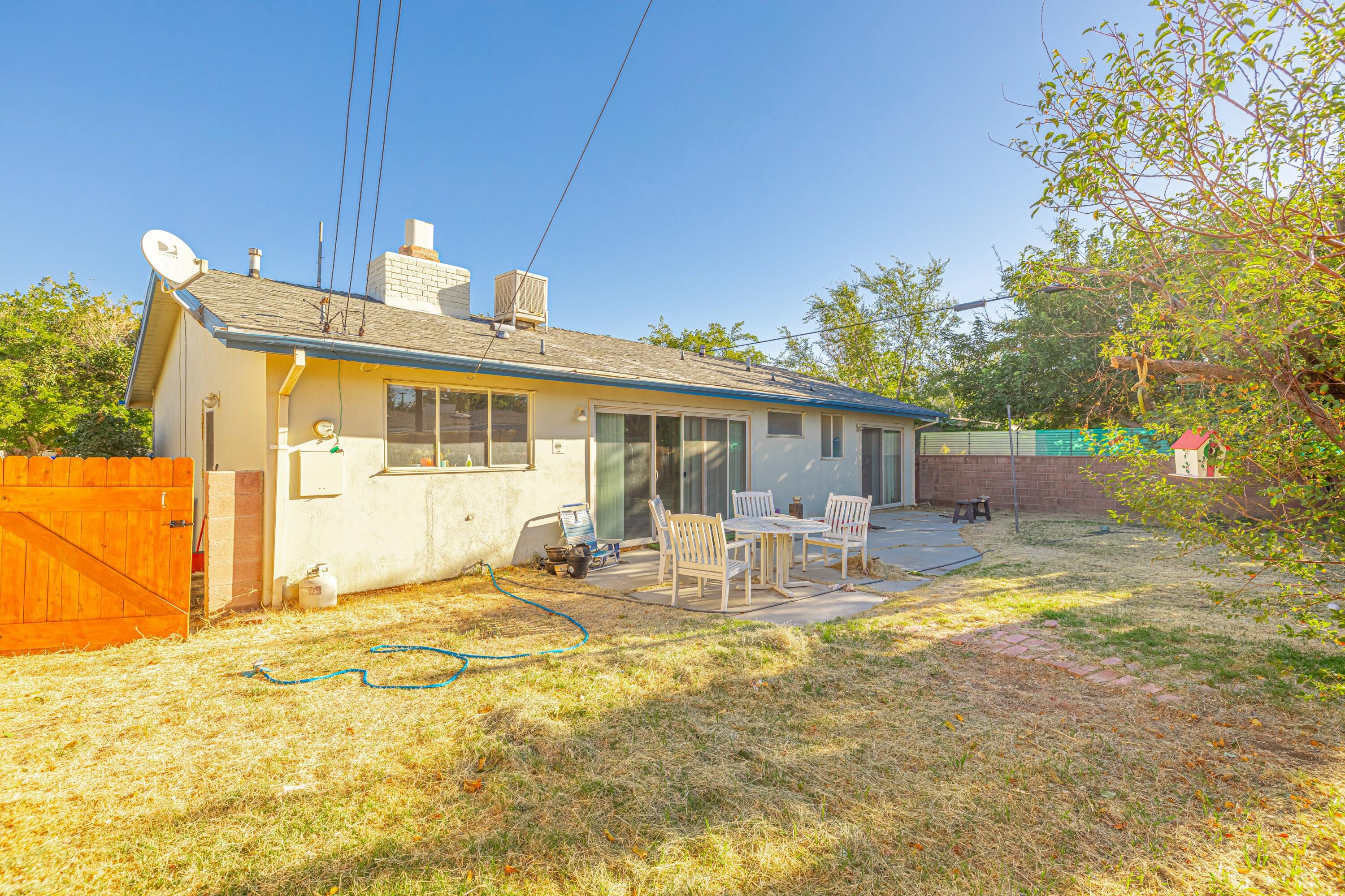 1108 Valiant Street Lancaster, CA 93534 - Photo 21 of 21 a view of a house with swimming pool