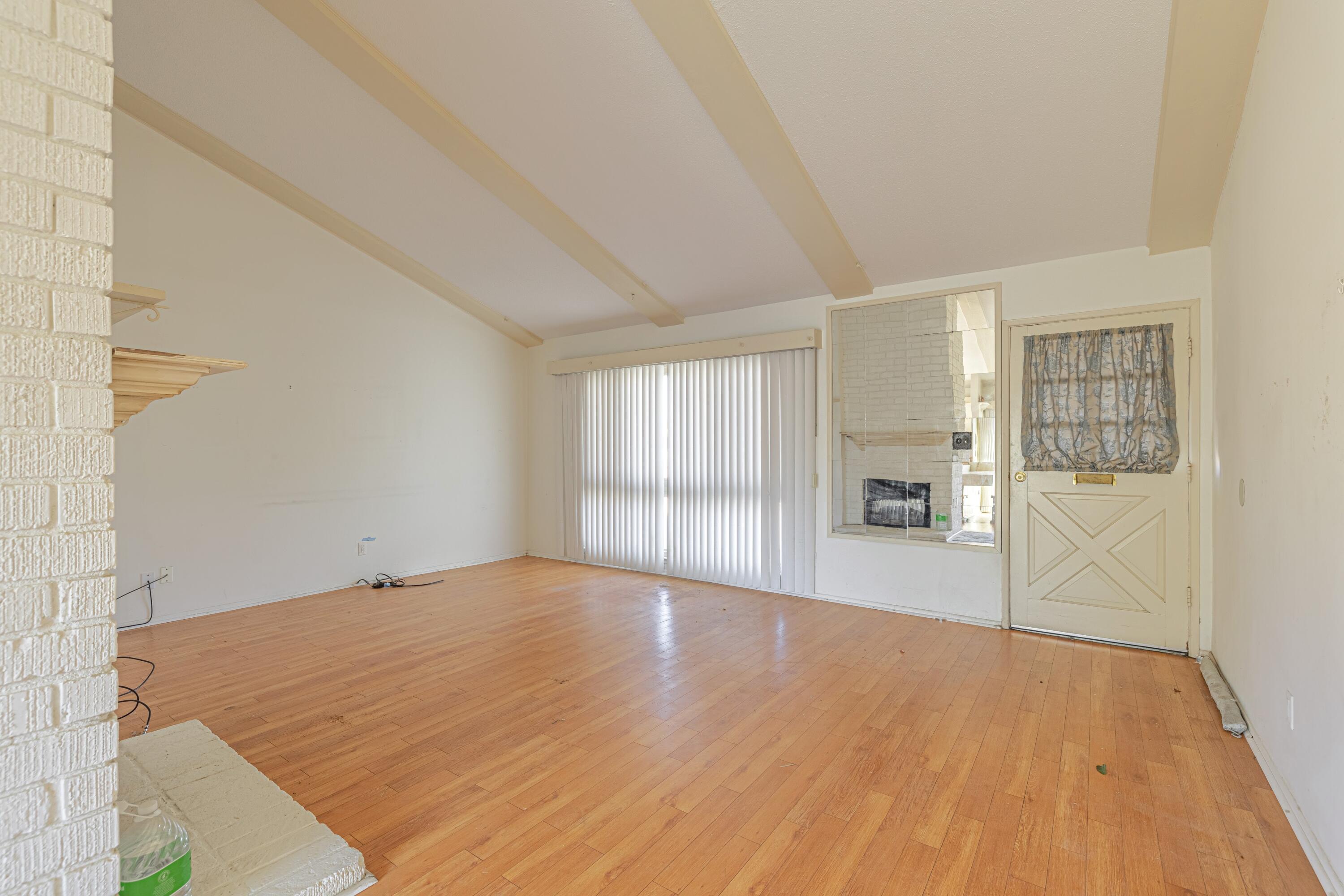 1108 Valiant Street Lancaster, CA 93534 - Photo 5 of 21 a view of empty room with wooden floor