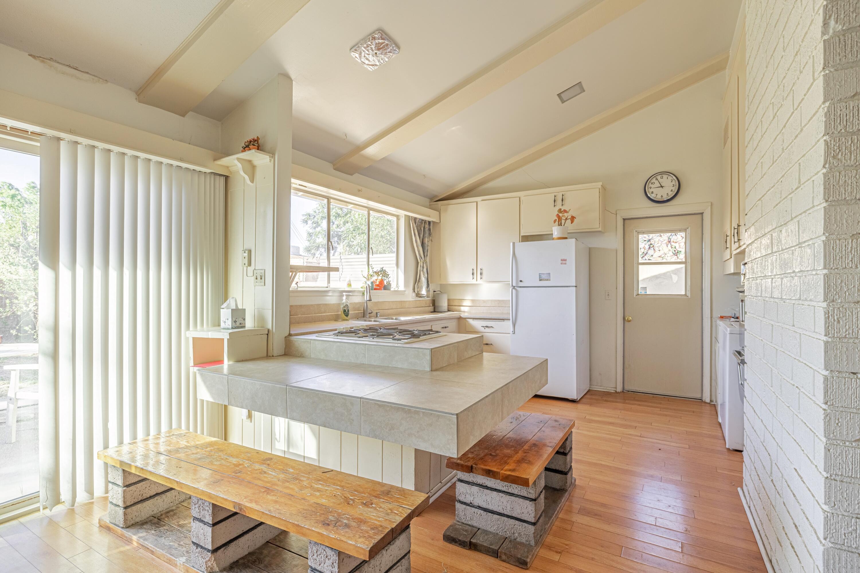 1108 Valiant Street Lancaster, CA 93534 - Photo 6 of 21 a living room with furniture and a table