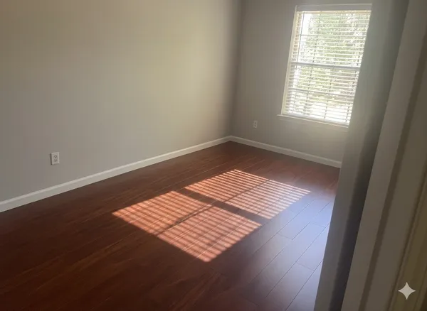 a view of an empty room and window
