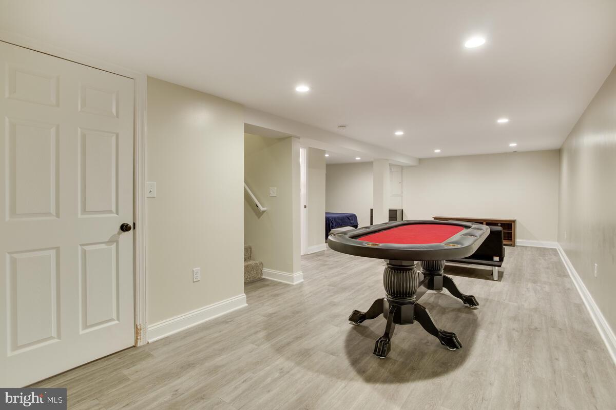 482 Round Up Road Lusby, MD 20657 - Photo 11 of 19 a room with furniture and a table