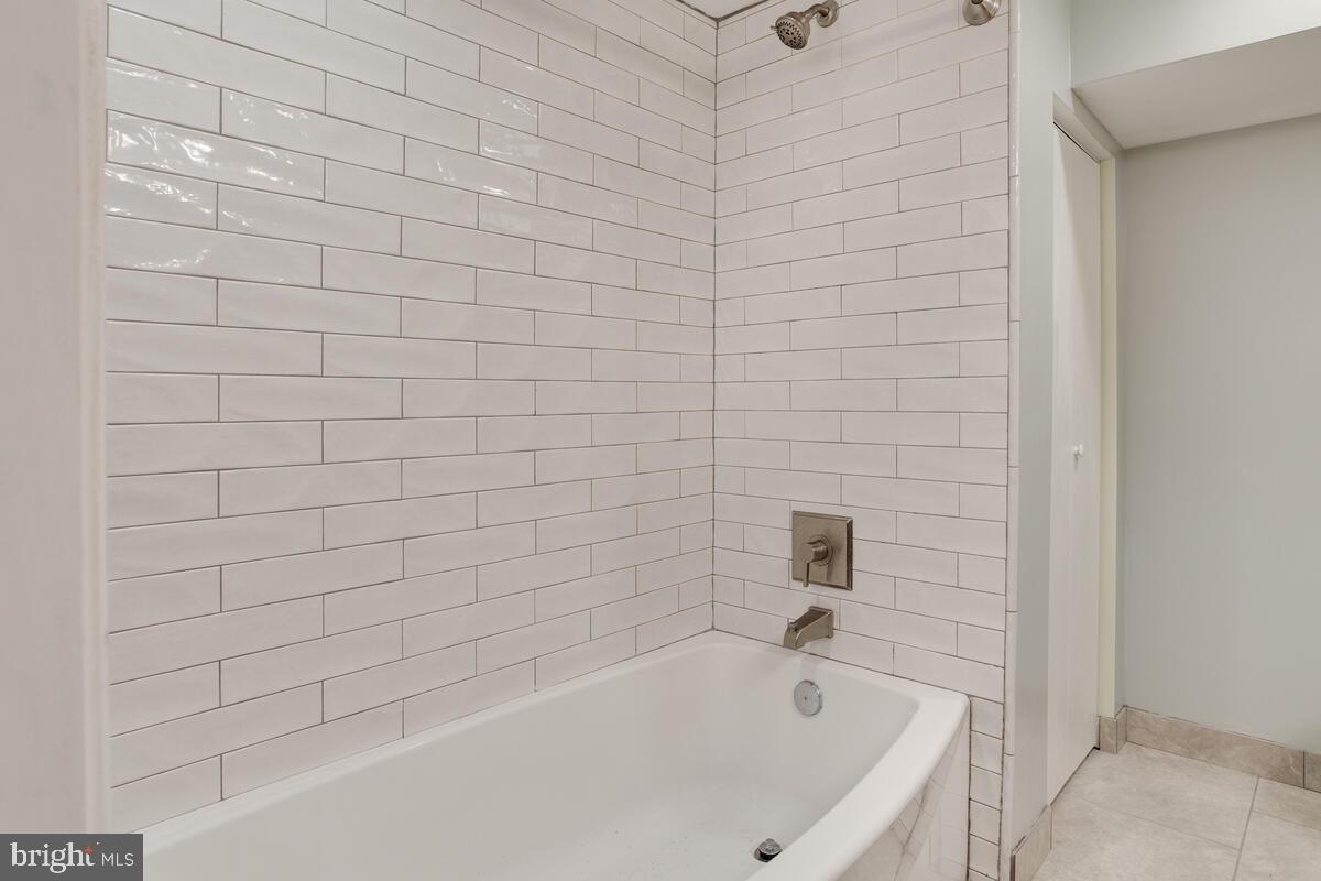482 Round Up Road Lusby, MD 20657 - Photo 15 of 19 a bathroom with a bathtub