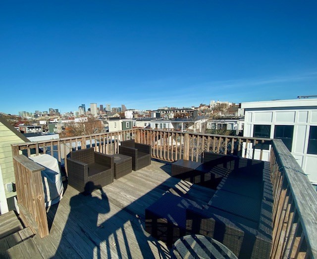 227 Bowen Street, Unit 3 Boston, MA 02127 - Photo 8 of 9 a view of a balcony with chairs