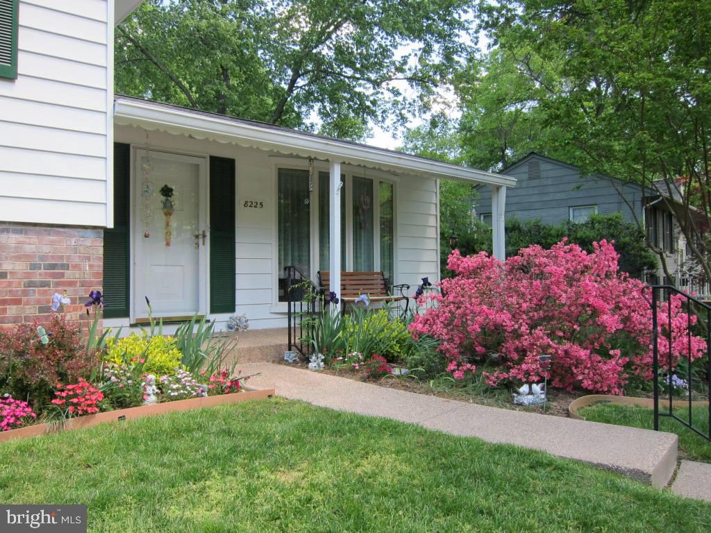 8225 Crown Court Road Alexandria, VA 22308 - Photo 45 of 57 Welcoming porch with bench to enjoy azaleas