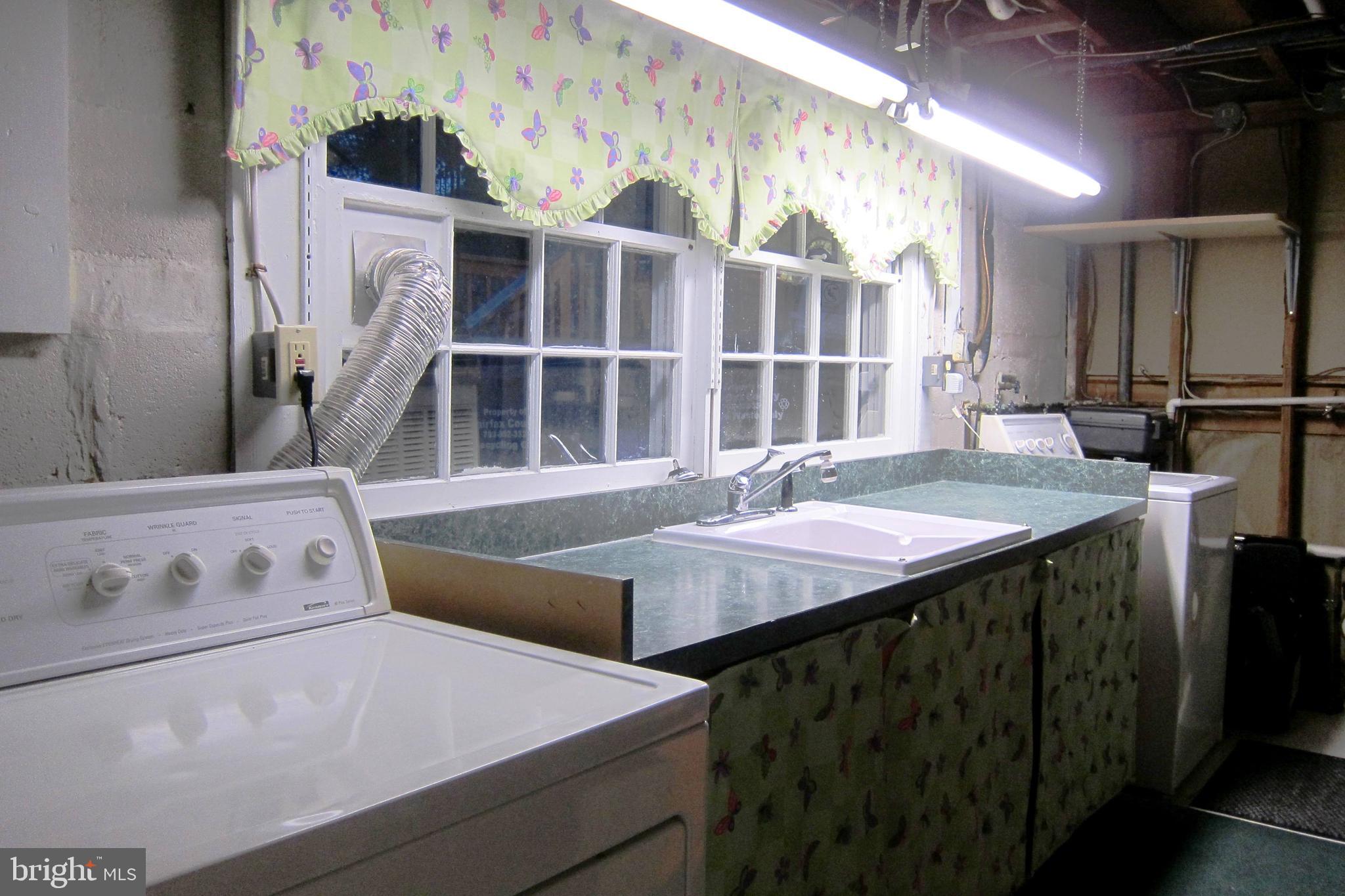 8225 Crown Court Road Alexandria, VA 22308 - Photo 53 of 57 Lower level Laundry with loads of storage