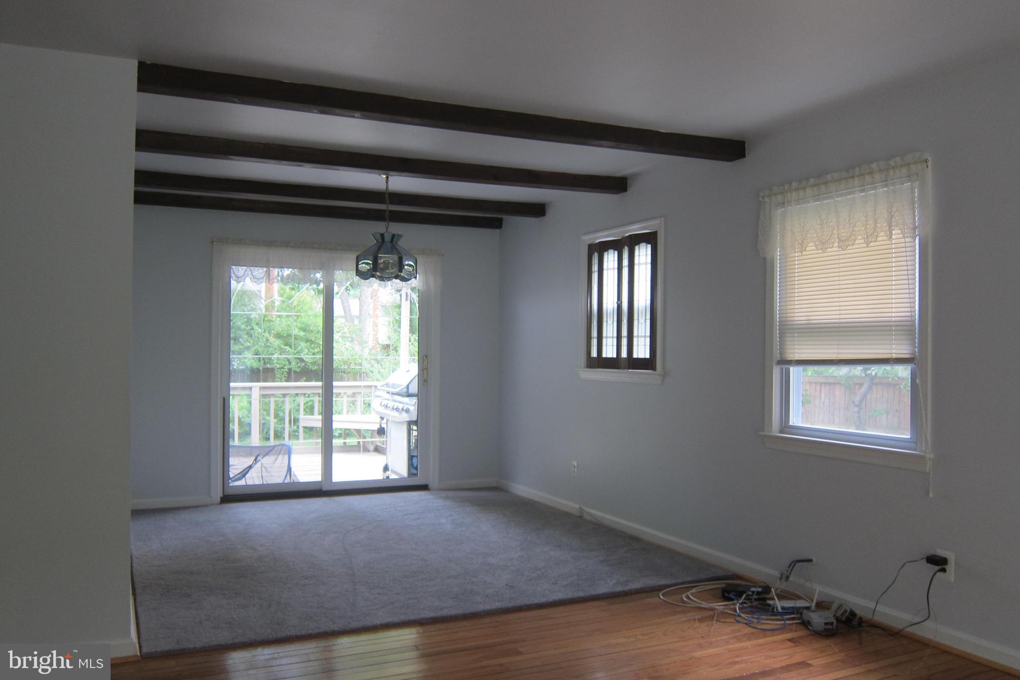 8225 Crown Court Road Alexandria, VA 22308 - Photo 8 of 57 Dining room with decorative rafters