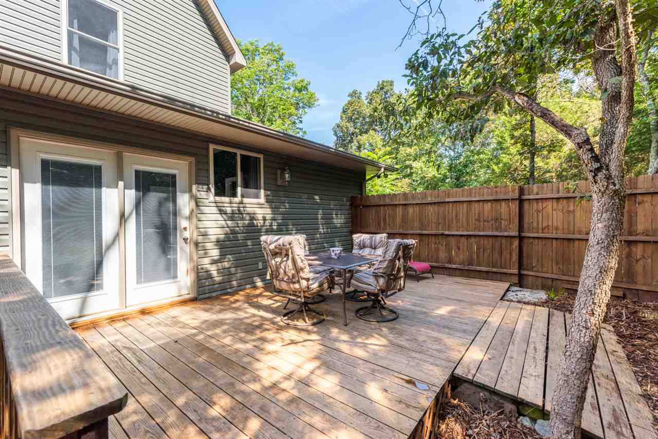 975 Limestone Road Mount Sidney, VA 24467 - Photo 25 of 49 a view of backyard with outdoor seating and wooden fence