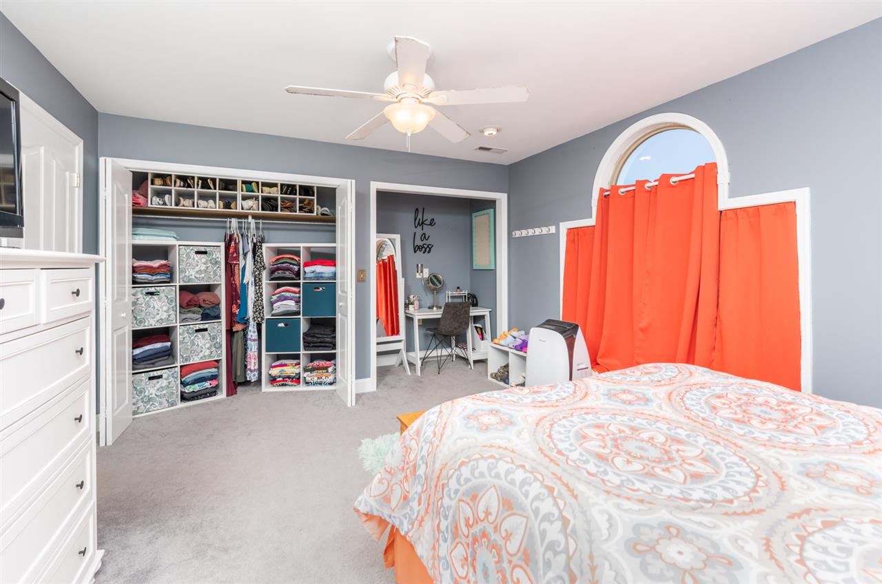 975 Limestone Road Mount Sidney, VA 24467 - Photo 30 of 49 a bedroom with a bed and a large closet