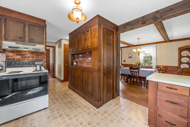 a view of a kitchen with furniture and a kitchen