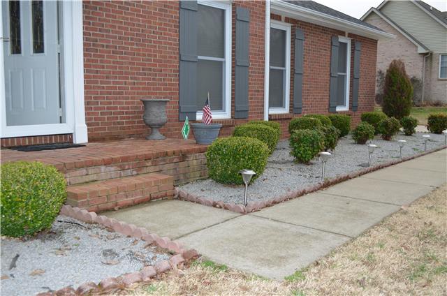 1821 Springs Inn Road Clarksville, TN 37043 - Photo 2 of 20 Landscaped sidewalk