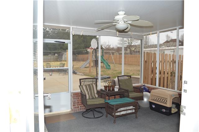 1821 Springs Inn Road Clarksville, TN 37043 - Photo 10 of 20 Sunroom/Screened in Porch area Overlooking Pool and Large Fenced Backyard