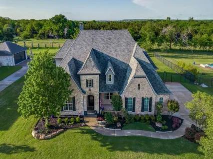 a aerial view of a house with garden