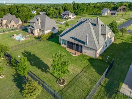 a aerial view of a house with garden