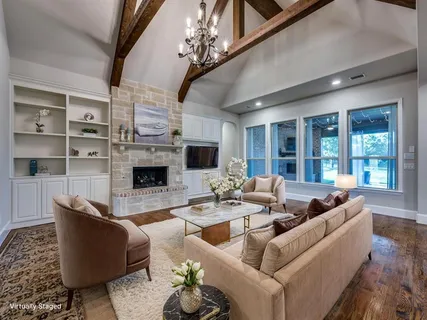 a large kitchen with stainless steel appliances granite countertop a lot of counter space