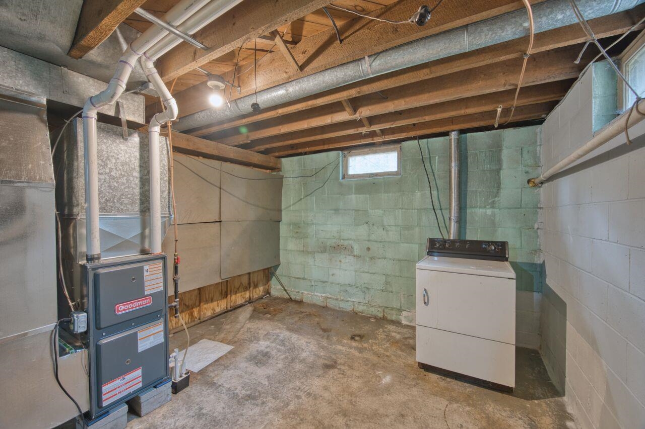 5462 Twin Lakes Loop 45 Aurora, MN 55705 - Photo 19 of 42 Basement with washer / clothes dryer and heating unit