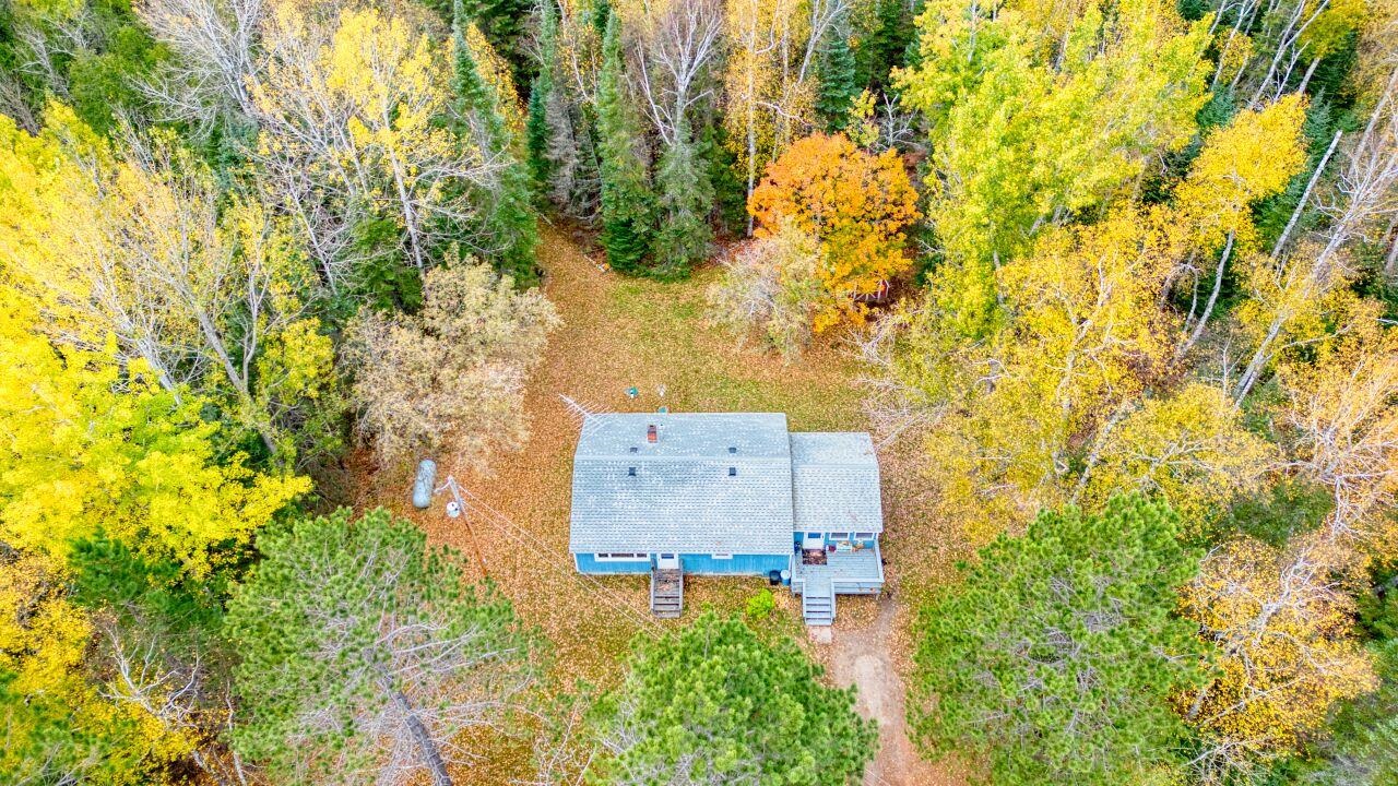 5462 Twin Lakes Loop 45 Aurora, MN 55705 - Photo 36 of 42 View from above of property featuring a tree filled landscape