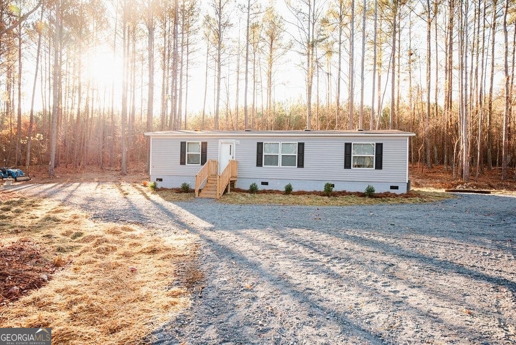 218 Jones Washington Road Aragon, GA 30104 - Photo 1 of 1 a view of a house with backyard
