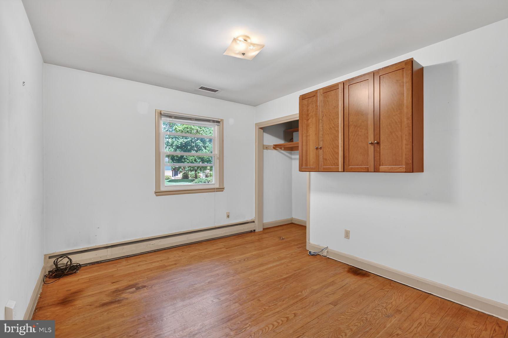 3029 Ramblewood Road Ellicott City, MD 21042 - Photo 13 of 21 Bedroom with worn flooring will require updates