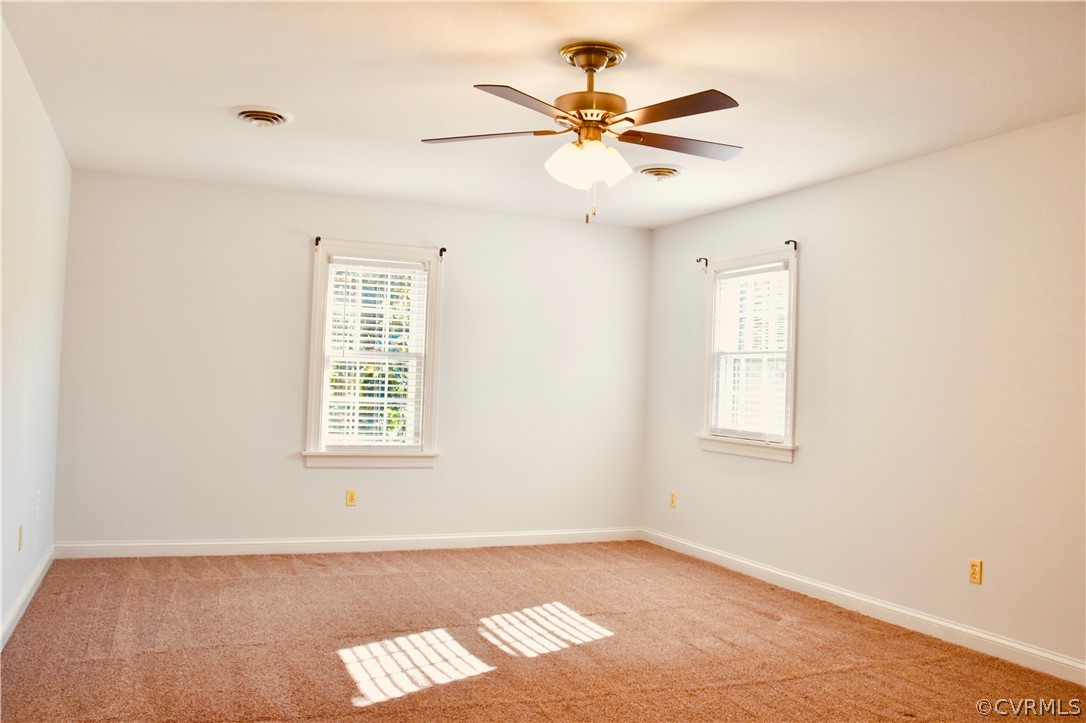 4010 Falstone Road Richmond, VA 23234 - Photo 11 of 19 a view of an empty room with a window