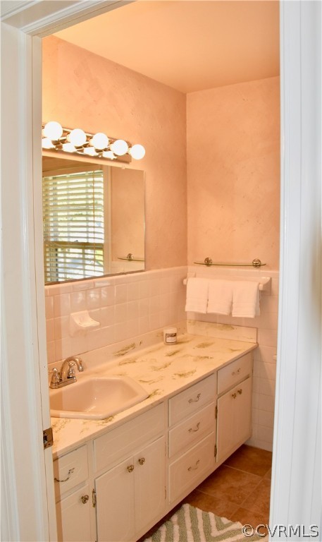 4010 Falstone Road Richmond, VA 23234 - Photo 12 of 19 a bathroom with a sink and a window