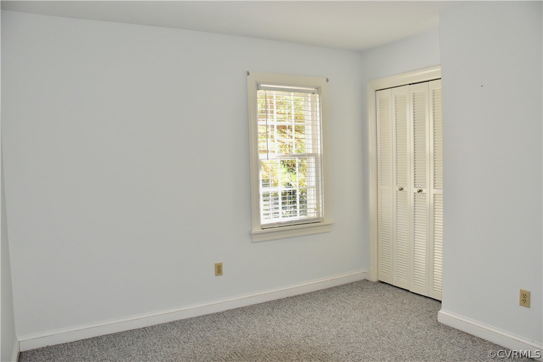 4010 Falstone Road Richmond, VA 23234 - Photo 16 of 19 an empty room with windows