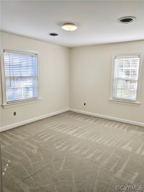 4010 Falstone Road Richmond, VA 23234 - Photo 17 of 19 an empty room with a window