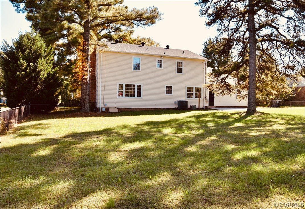 4010 Falstone Road Richmond, VA 23234 - Photo 19 of 19 a view of a house with a yard