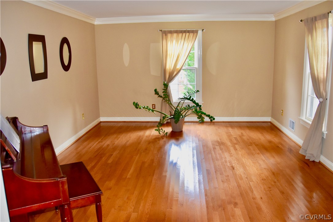 4010 Falstone Road Richmond, VA 23234 - Photo 3 of 19 a view of entryway with wooden floor