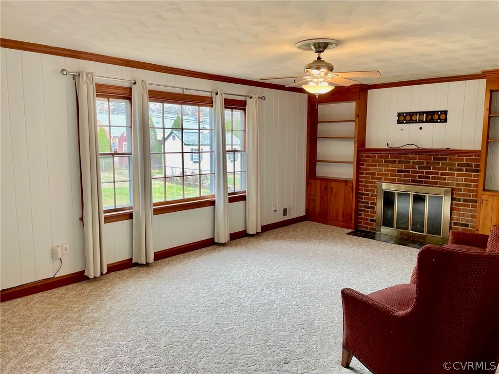 4010 Falstone Road Richmond, VA 23234 - Photo 5 of 19 a living room with furniture and a fireplace