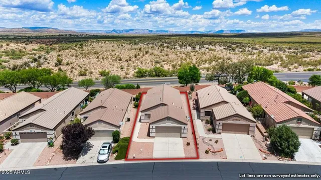 an aerial view of residential building with outdoor space