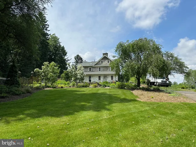 a view of a house with a big yard