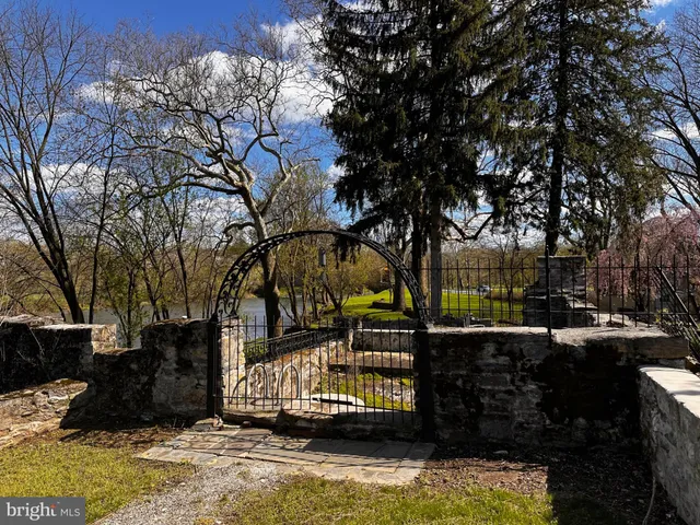 a view of swimming pool with a patio