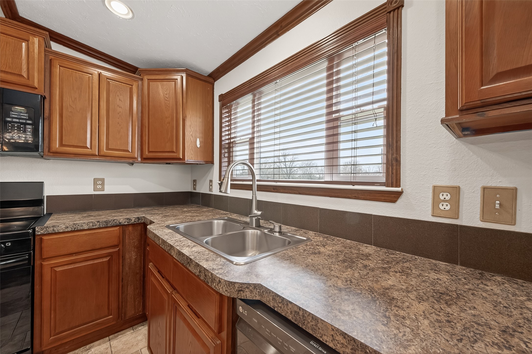 9820 Oberrender Road Needville, TX 77461 - Photo 14 of 34 Large Kitchen with Island and Sliding Doors overlooking acreage