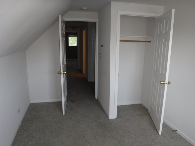 513 Pulaski Road Calumet City, IL 60409 - Photo 12 of 18 a view of a room with a hallway