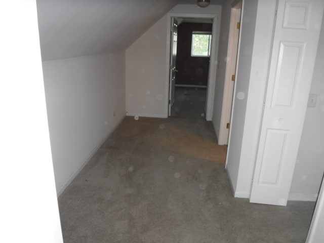 513 Pulaski Road Calumet City, IL 60409 - Photo 13 of 18 a view of a room with a hallway
