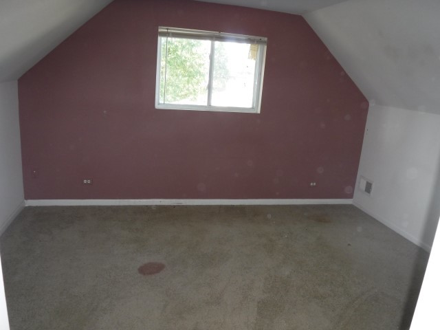 513 Pulaski Road Calumet City, IL 60409 - Photo 15 of 18 an empty room that has a window