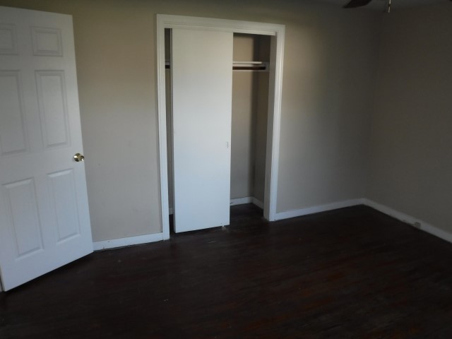 513 Pulaski Road Calumet City, IL 60409 - Photo 8 of 18 an empty room with wooden floor sink and closet