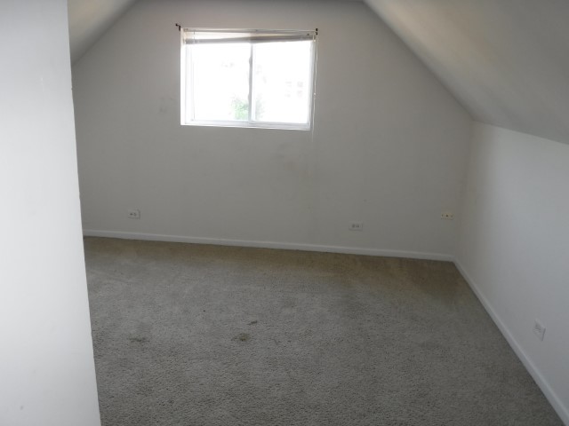 513 Pulaski Road Calumet City, IL 60409 - Photo 10 of 18 an empty room with a window
