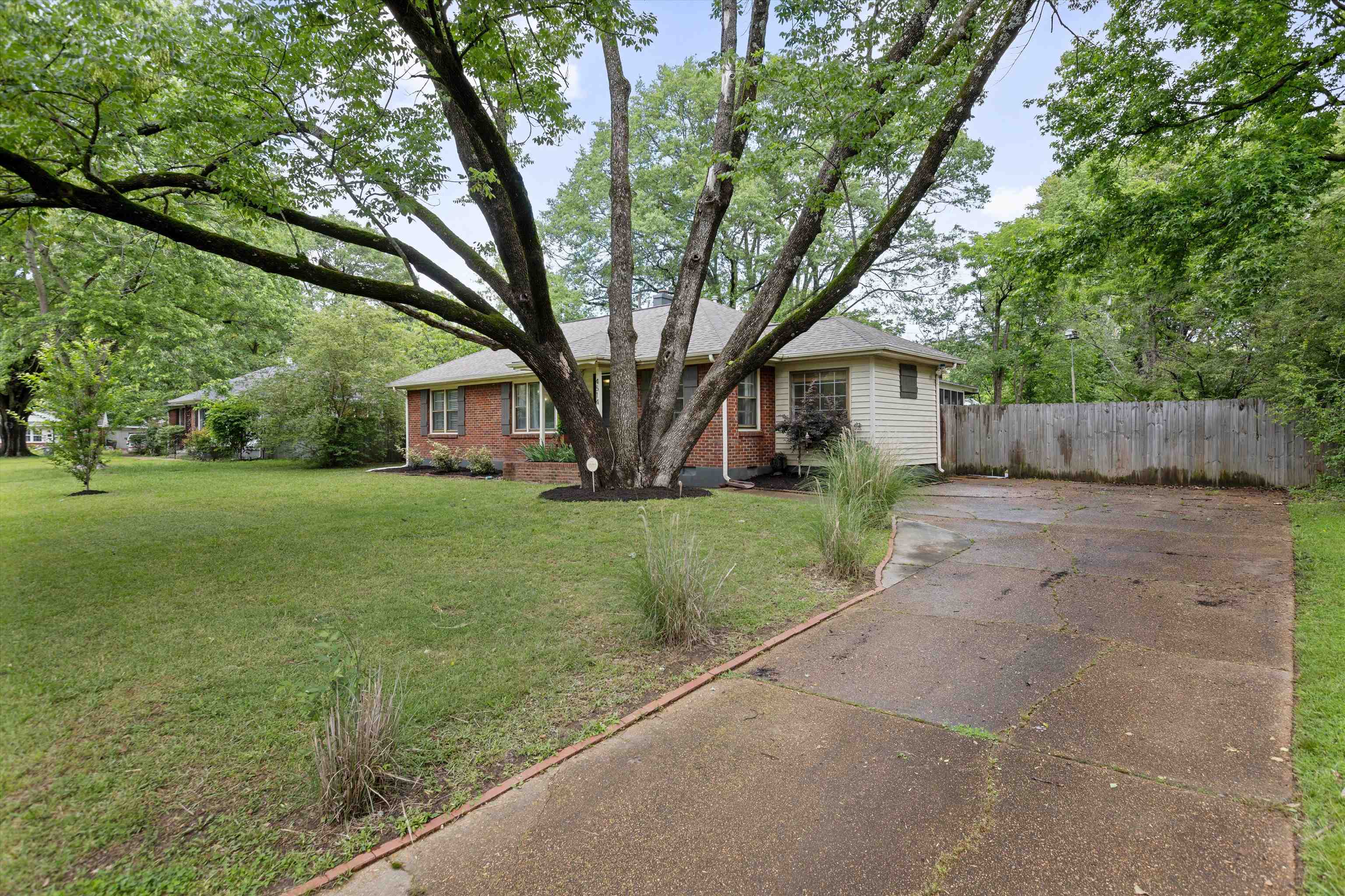 4514 Verne Road Memphis, TN 38117 - Photo 2 of 26 a view of house with a yard
