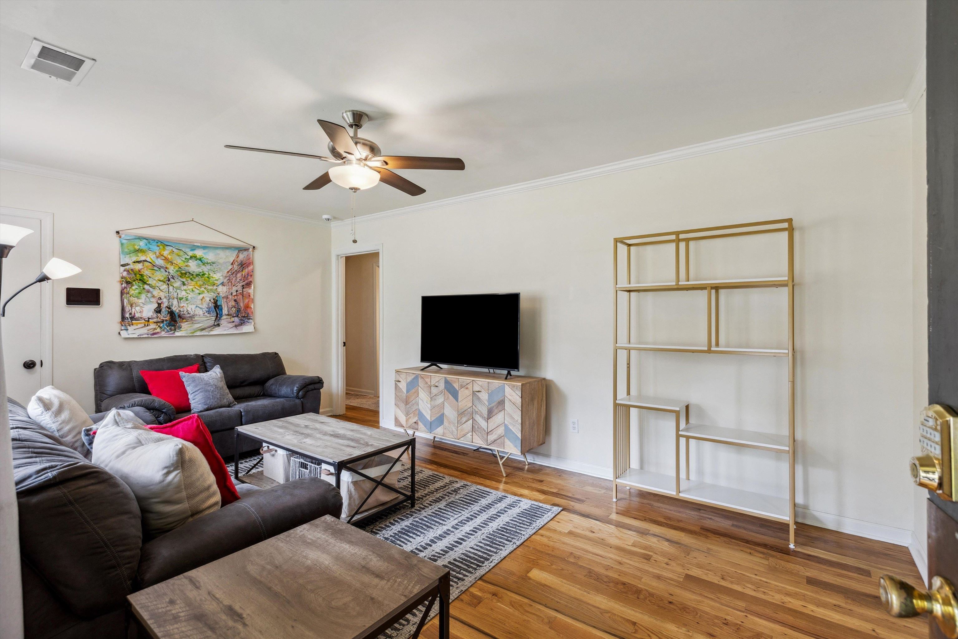 4514 Verne Road Memphis, TN 38117 - Photo 4 of 26 a living room with furniture and a flat screen tv